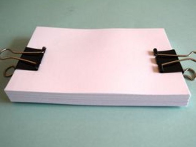 Use binder clips to secure pages.