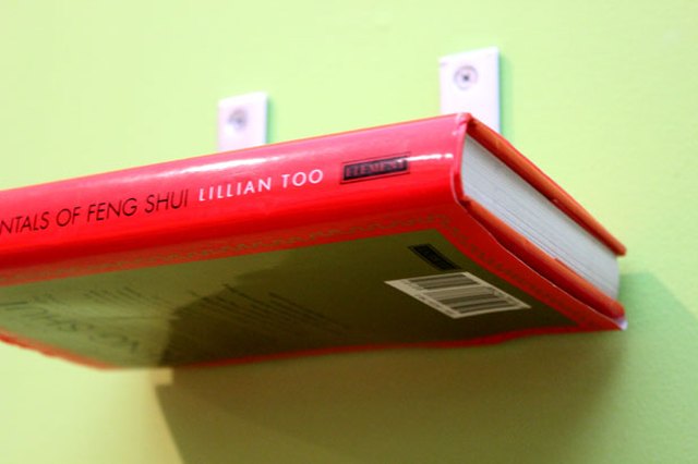 Hide the L-brackets with the dust jacket