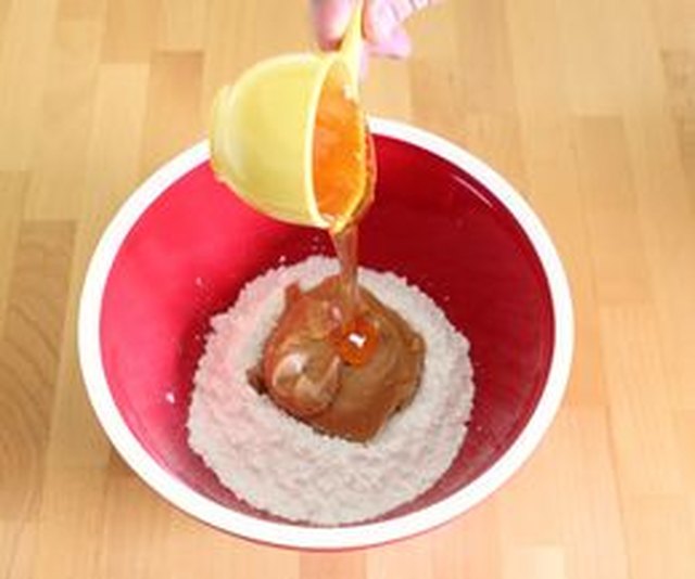 Combine powdered sugar, peanut butter and honey in your bowl.