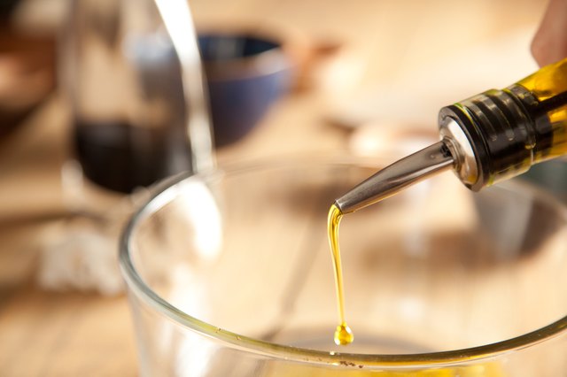Olive oil poured into mixing bowl.