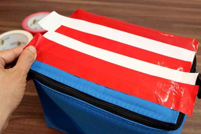 Layer red and white duck tape to make stripes