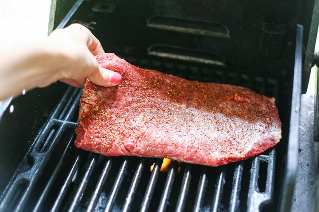 Skirt steak on grill.