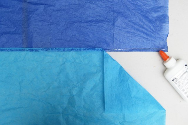 Glue sheets together.