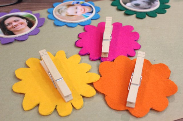 Attach clothespins with hot glue