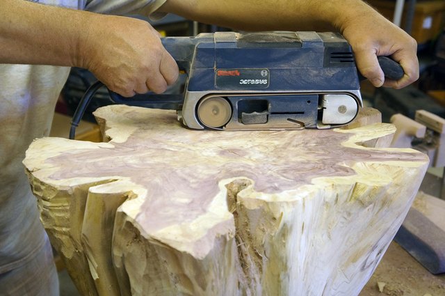 Belt sanding the flat surfaces.