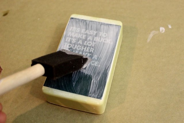 Apply decoupage glue on top of the image