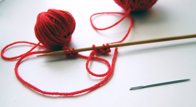 Cast on using two balls of yarn.