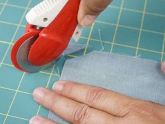 Trim material at corners.