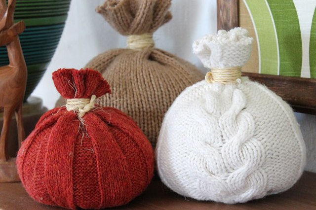 Create a cozy environment this fall with sweater pumpkins.