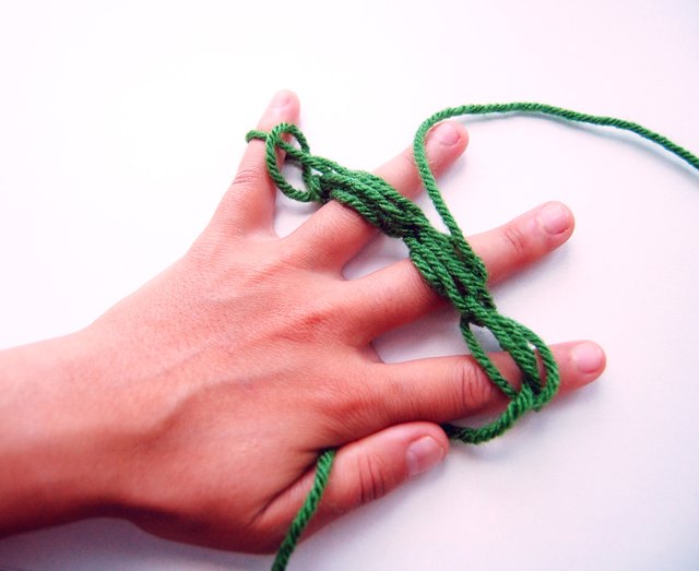 View the knitting from the back to see the cord.