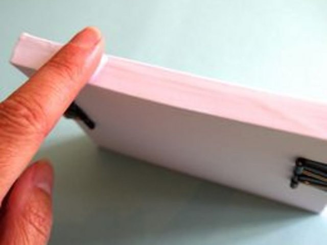 Glue the spine.