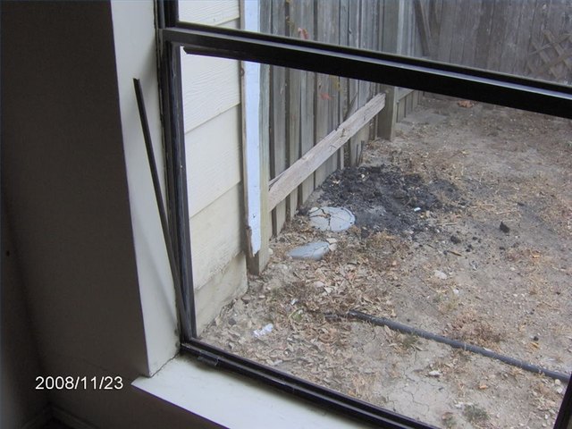 Brittle and damaged vinyl weatherstripping.
