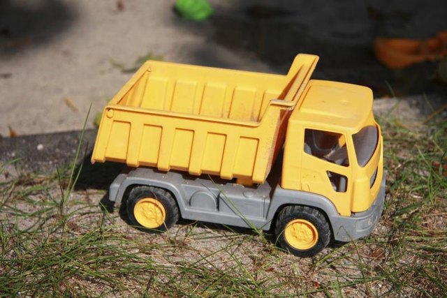 Toy dump truck on lawn