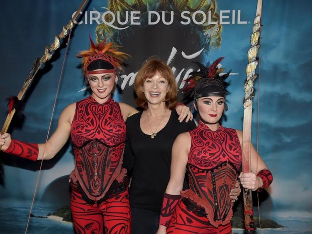Members of Cirque du Soleil doing promotion.