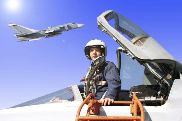 A military pilot in his jet.