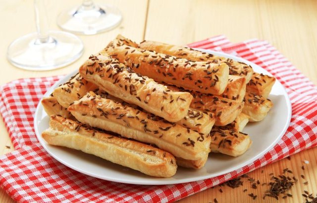 Pastry bread sticks with caraway seeds.