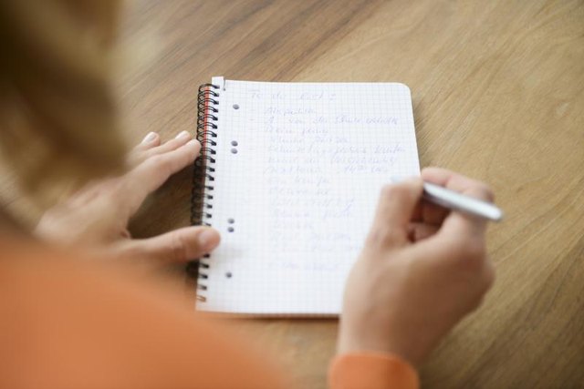 A woman checks off things off her list