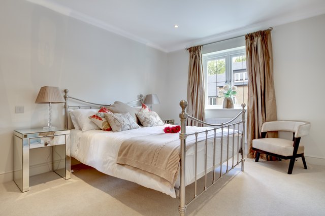 Metal bed frames with headboards and foot boards are the easiest to assemble.