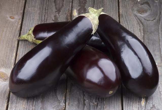 Eggplants on table.