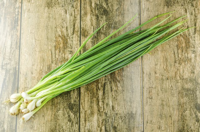 Bunching onions can grow in 6-inch-deep pots.