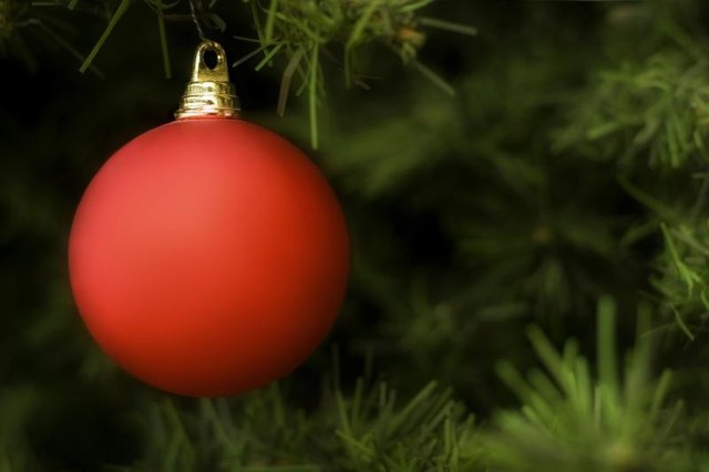 A Christmas ornament on a tree. A Christmas ornament on a tree.