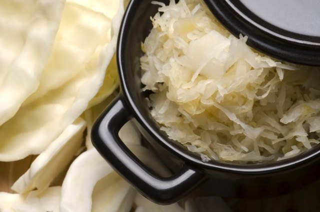Fermented cabbage, sauerkraut, is in a dish.