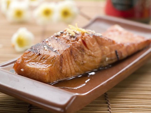 Grilled salmon on a plate.