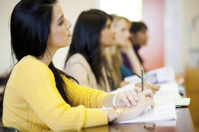 Group of students in a college classroom.