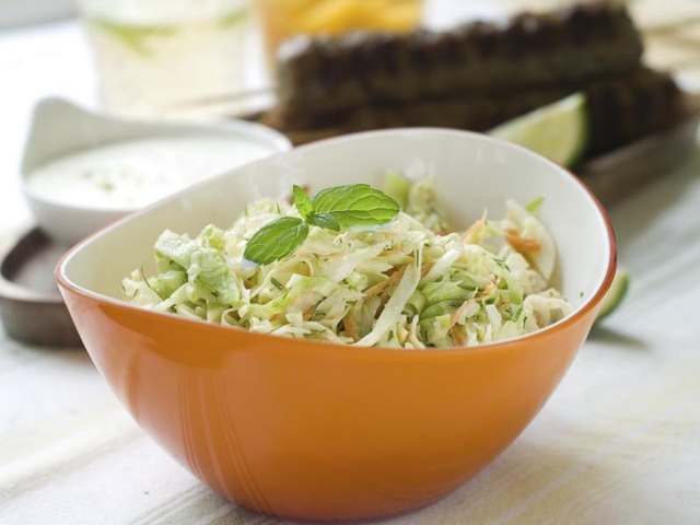 A bowl of cole slaw.