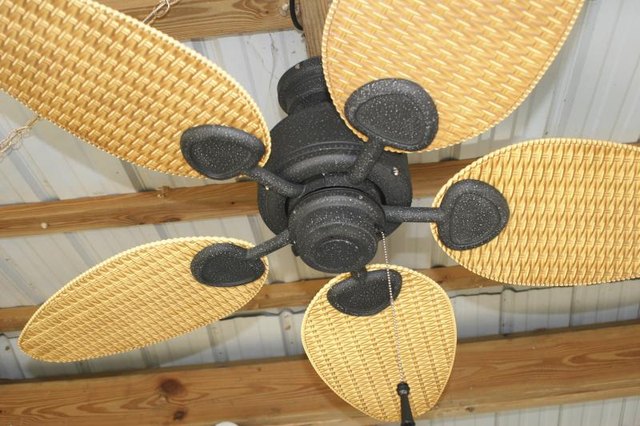 An electric ceiling fan mounted on a patio.