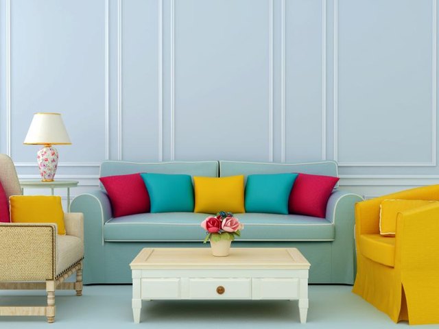Livingroom with pale blue walls.