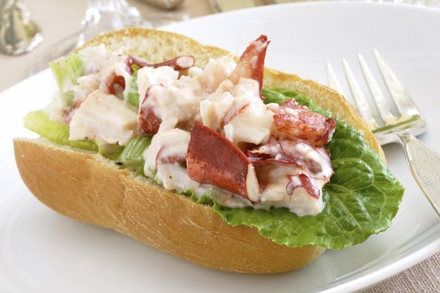 A lobster roll on a plate.