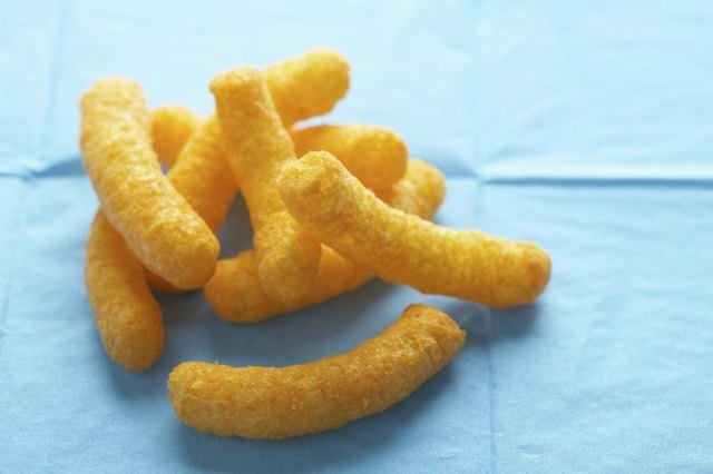 Cheese puffs on napkin.