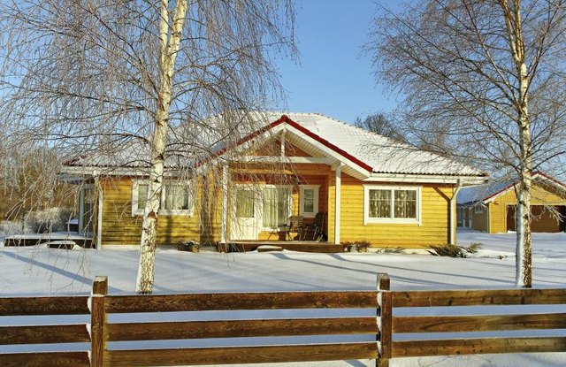 A country house with a hip roof
