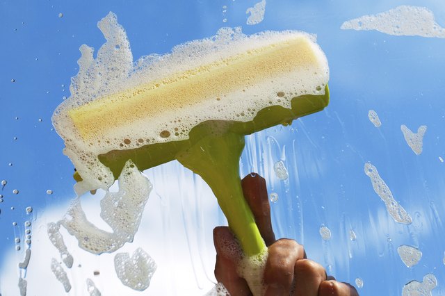 Scrub dirt with a sponge.
