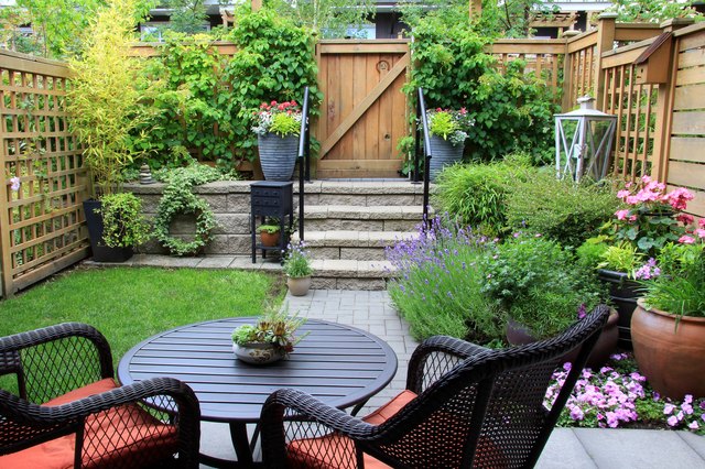 Put plants in containers that complement the background materials.