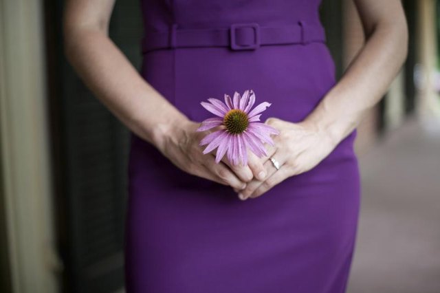Woman in purple cocktail dress