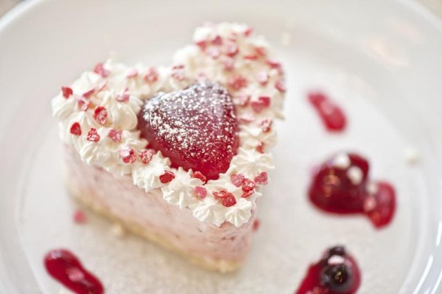 A close-up of a heart shaped cake.