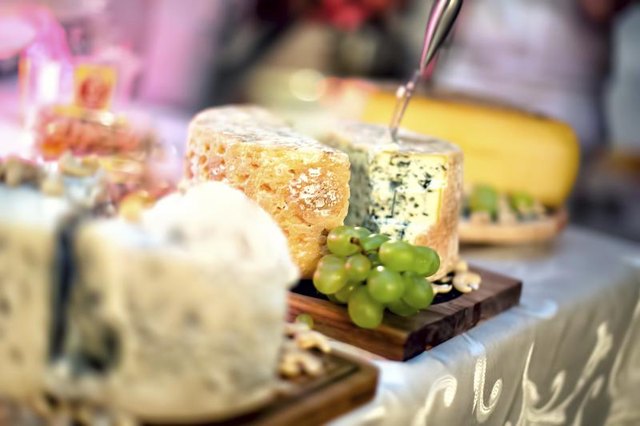 Variety of cheeses on a dining table