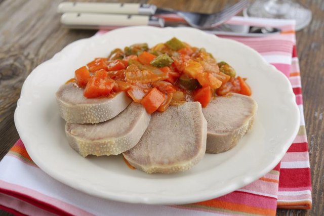 Beef tongue with vegetables.