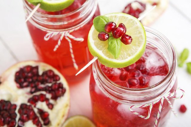 Two glasses of pomegranate juice.