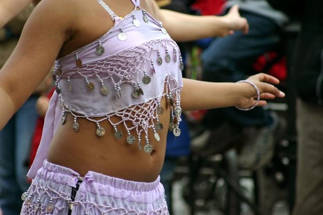 A belly dancer teaching the art.