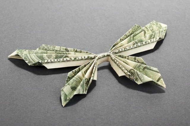 Origami butterfly made from money