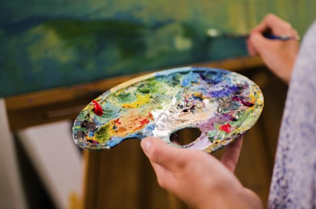 Artist holding palette