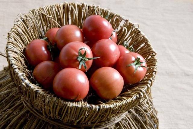 Small basket of tomatoes.