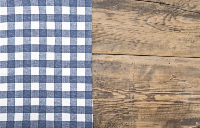Tablecloth on a wood table.