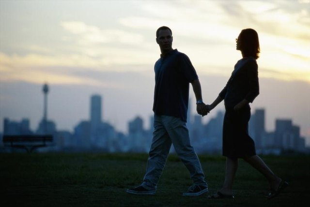 A couple taking an evening stroll.