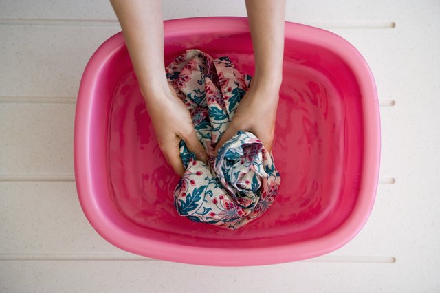 Even though some fabrics say hand wash only, dry cleaning might be the better option.