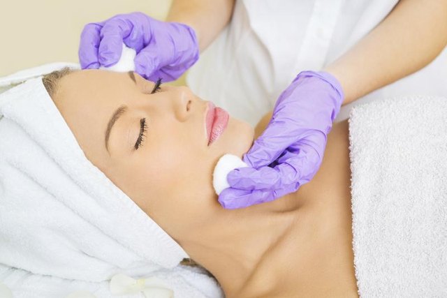 Woman receiving skin-care treatment