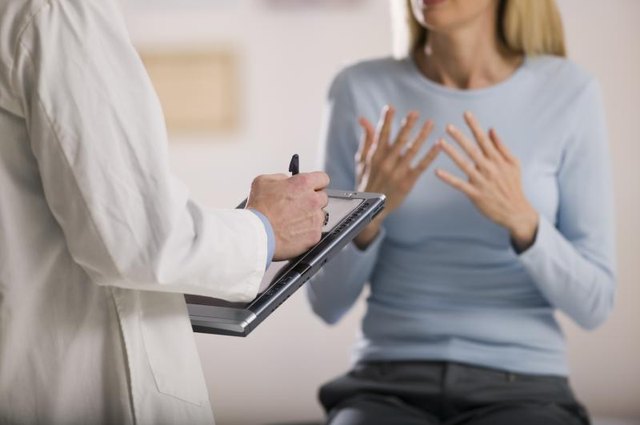 Patient speaking with doctor.